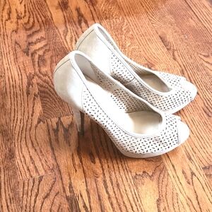 Size 7 suede tab pumps with peep toe.  Platform shoe.